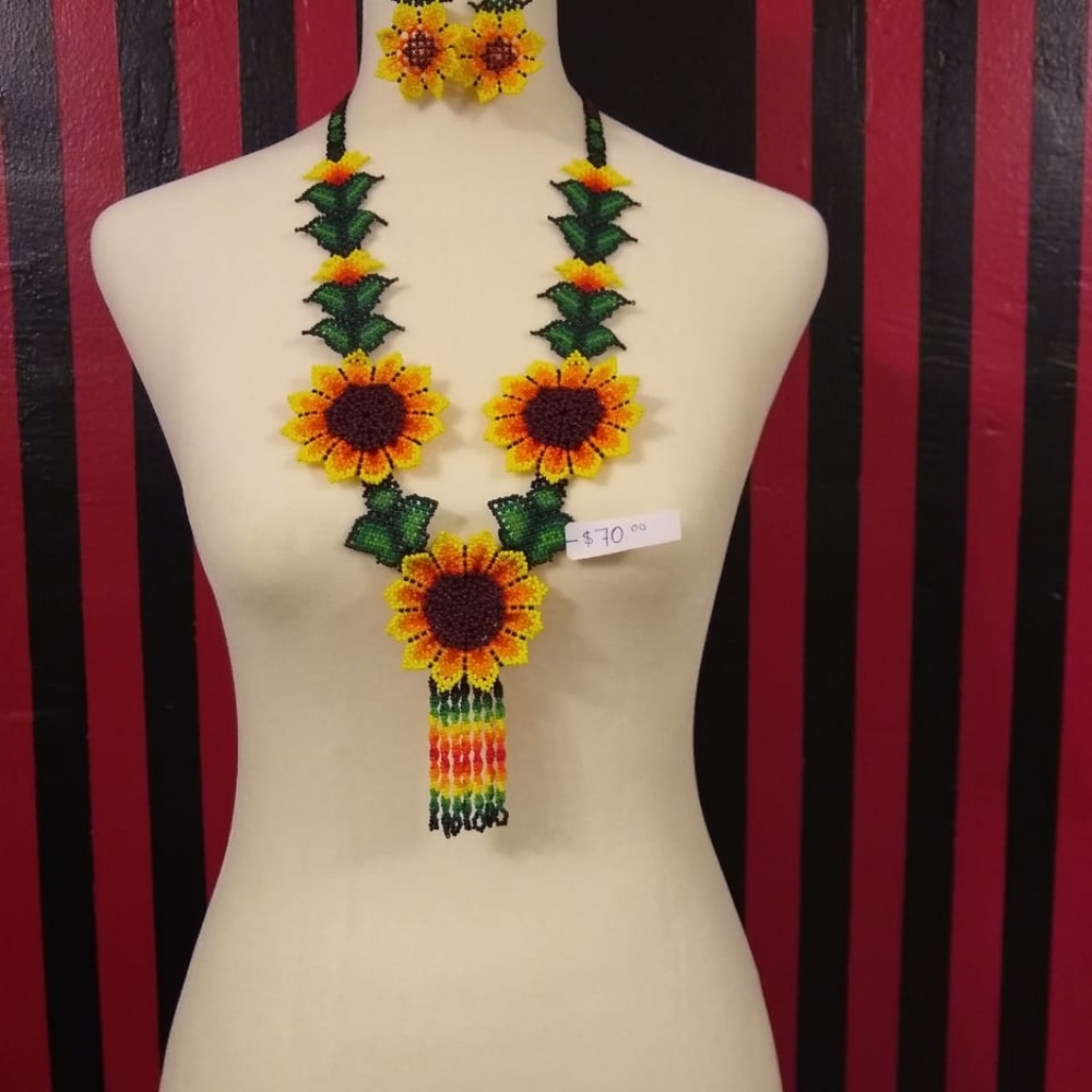 This is a beaded necklace with earrings